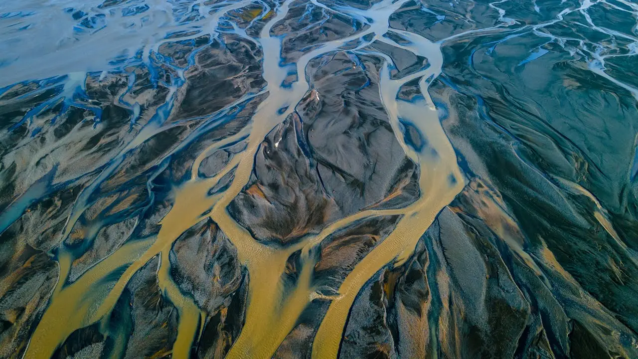 Stunning aerial photo capturing intricate river patterns and earth textures.